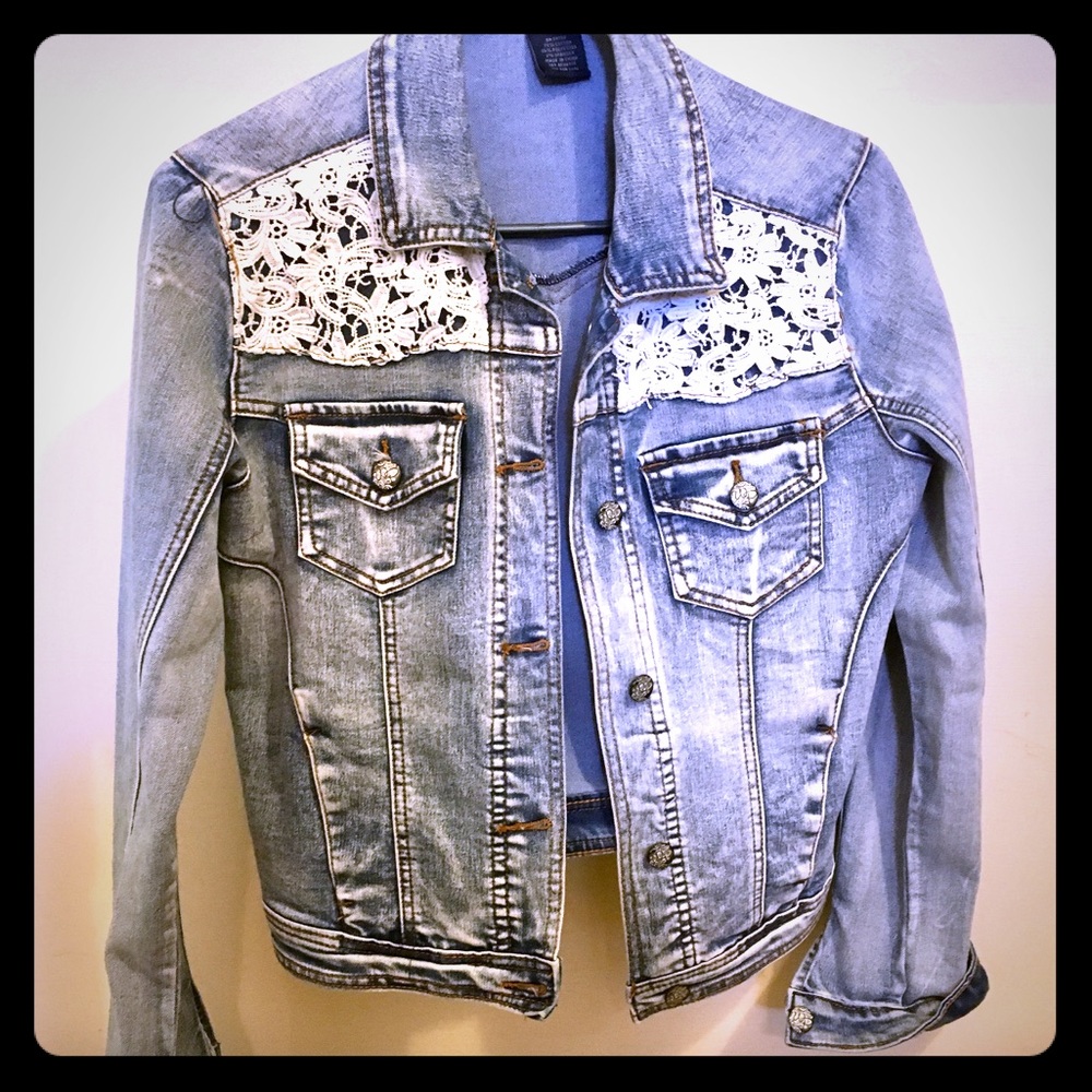 Denim jacket with lace insets.
